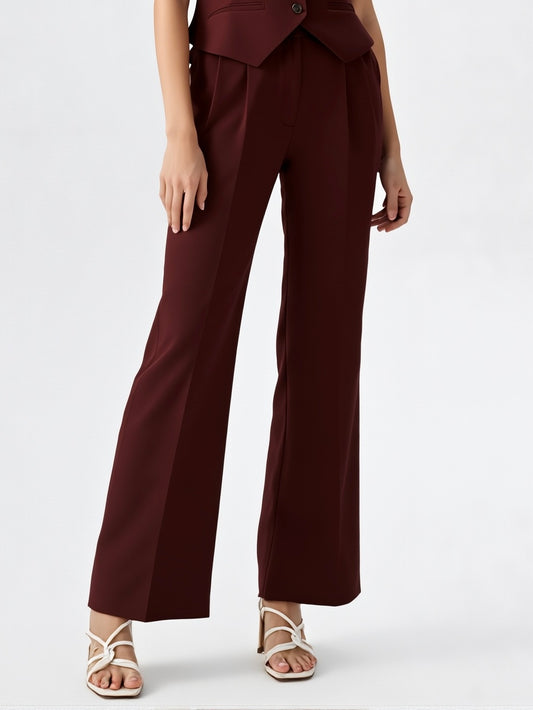 Elegant straight-fit trousers in a deep burgundy color, showcasing a tailored look with front pleats and a high-waisted fit.