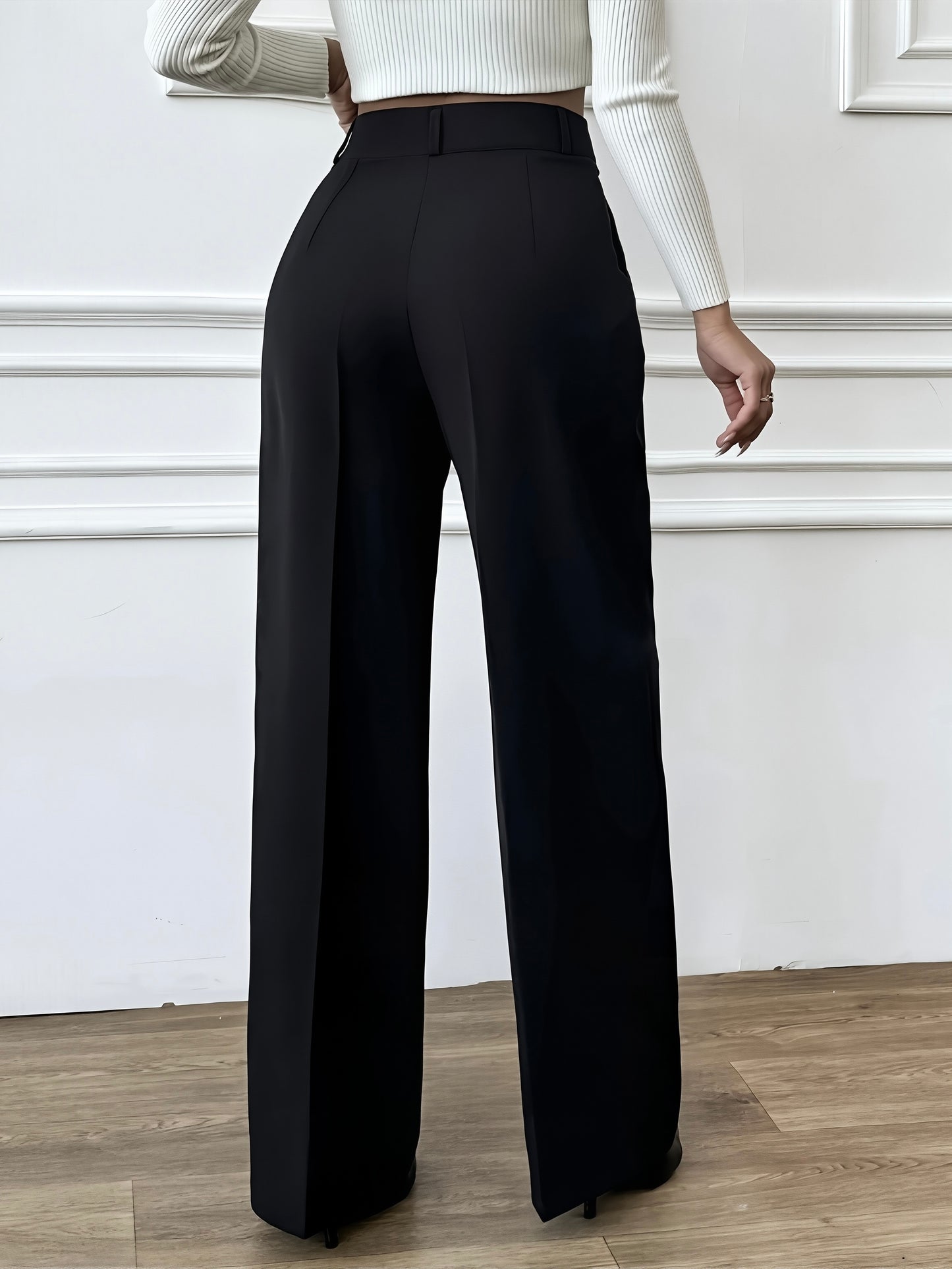 Elegant black wide leg trousers showcasing a sleek straight-fit design from the back view.